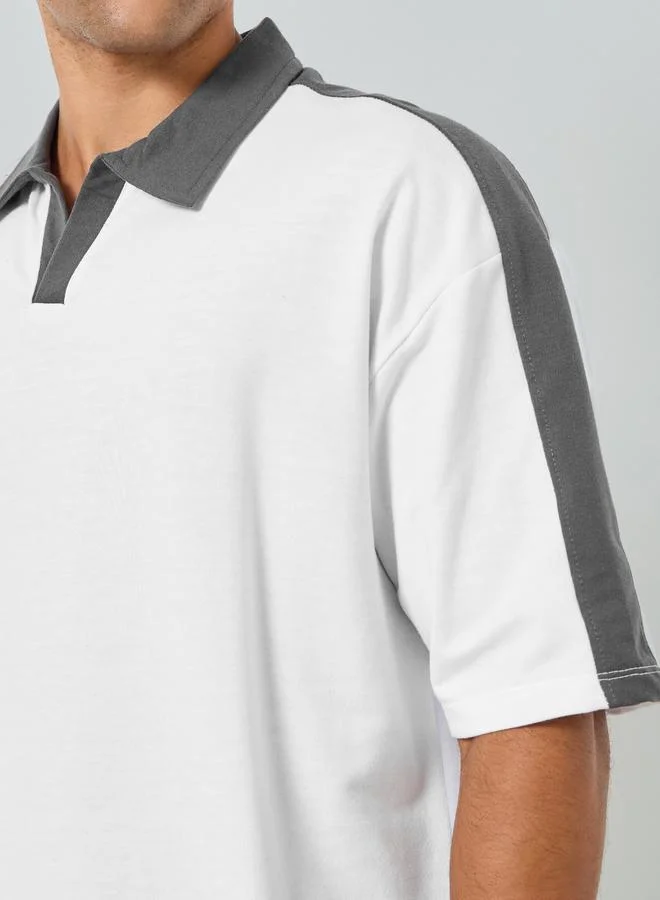 ستايلي طقم منسق من تيشيرت بولو واسع وشورت للرجال